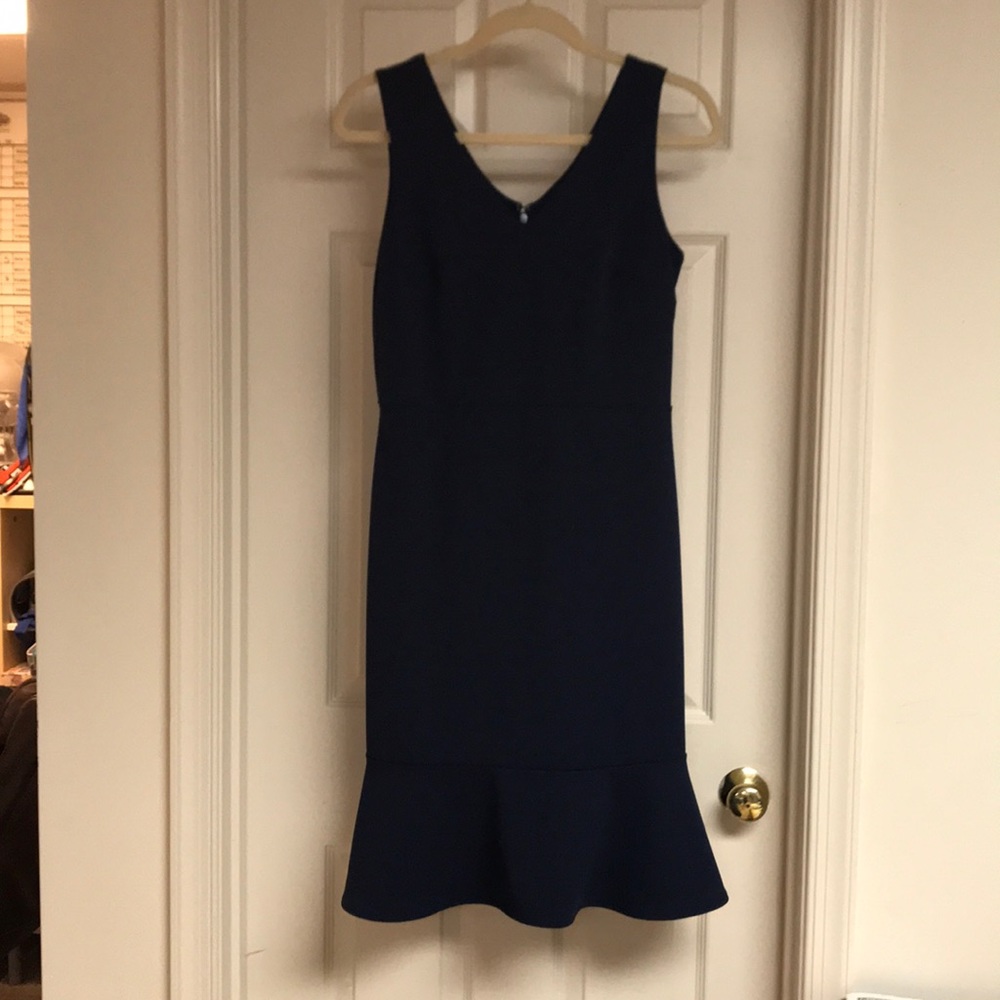 Classy navy dress with ruffle design on bottom